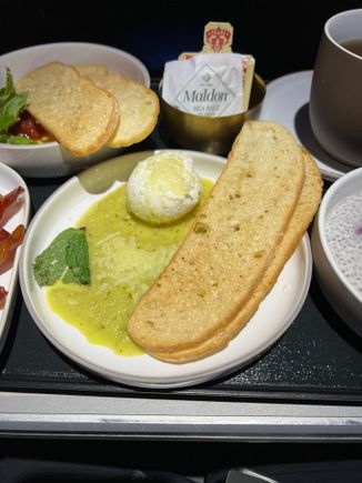 Poached egg with green tomato salsa verde, parmigiano, crostini 


