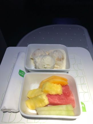 Banana ice cream and vanilla ice cream.  Fresh fruit