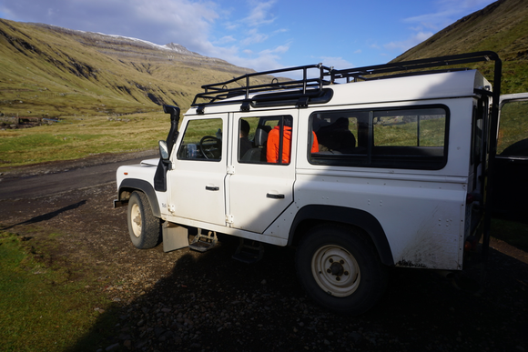 Guests are driven to the restaurant in an old Defender