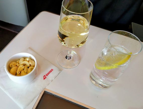 Apéritif with hot nuts in SWISS Business class 