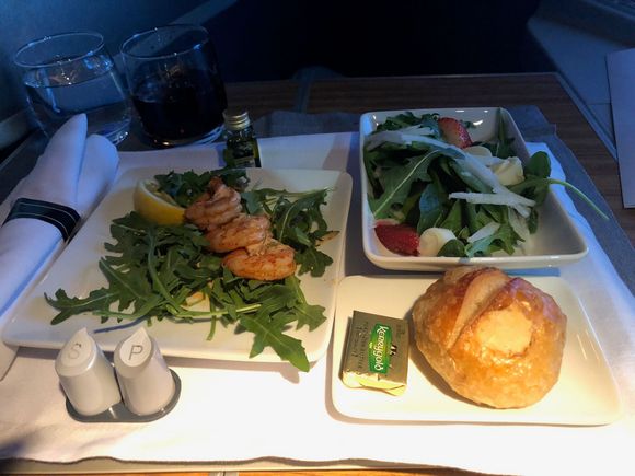 The 'small plate' (poached shrimp remoulade with arugula) and salad (baby spinach and arugula salad) were served together. I'm not big particularly fond of shrimp, so this went untouched. However, the salad was delicious and fresh. The flight attendant also came around with a small selection of rolls. I picked sourdough,  which was served warm. 