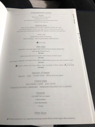 A photo of the Western meal menu; I ended up ordering just the caviar and dessert off of here. They were probably the top things I ate this flight. 