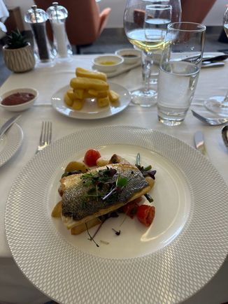 Sea bass main with a side of chips. 