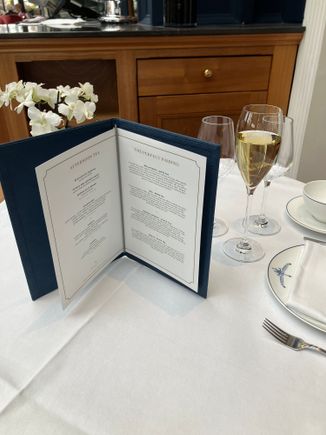 Afternoon tea menu + glass of champagne