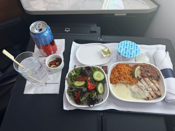 Nuts warm. Chicken was moist. Beans delicious.  Wished I had some tortilla chips for the queso. Bread (not pictured) did the trick. Blueberry vanilla pudding not bad. 