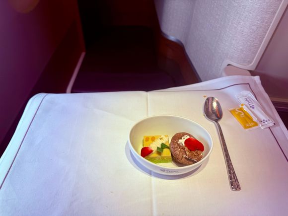 Delicious and appropriately portioned dessert with one western item and one Thai item.