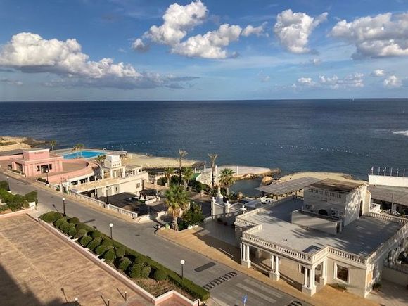 View from the suite. Restaurants in the foreground, and pool and terraces for lounging/swimming (in summer). 