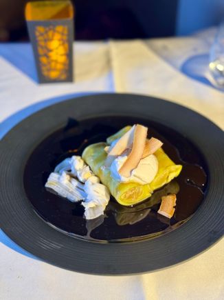 Pandan crepes with coconut cream palm sugar syrup. 10/10 for me