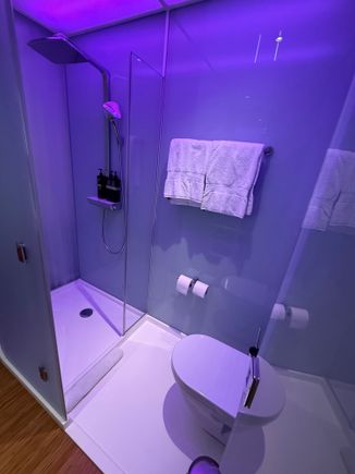 The bathroom had a proper door to the toilet and a door to the shower, so the bathroom does not get flooded when showering.