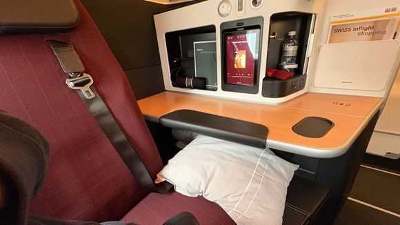 Plenty of space on the left. Below my pillow is a large, deep locker (big enough for shoes, camera and probably a laptop, but not for a canin bag or backpack)