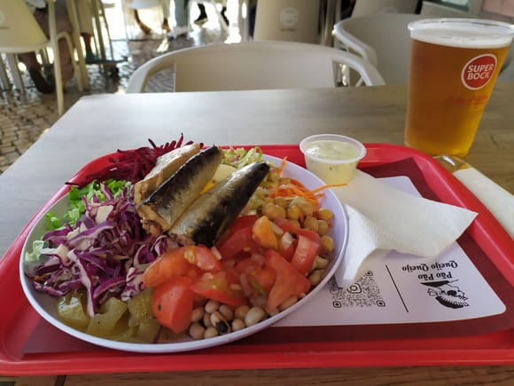 Sardines and salad at Pão Pão Queijo Queijo, a simple sidewalk café in Belem