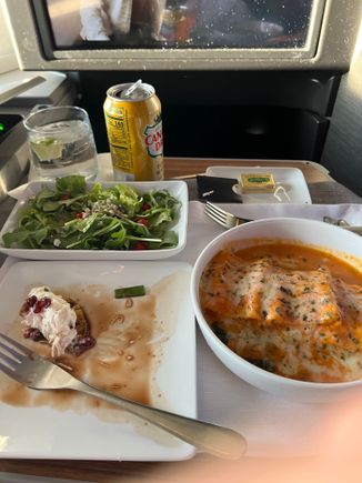 Served quickly all on one tray so pax can sleep.  Lovely senior Hawaii based crew worked our aisle.   Excellent service.  Skipped dessert and Continental breakfast.   Slept.  On time departure and early arrival. 