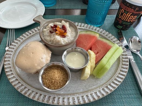 Breakfast Day 3: Fruit, yogurt, guava duff muffin, & oatmeal