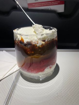 Sundae with all the fixings (peanuts, whipped cream, 🍓, caramel and hot fudge)