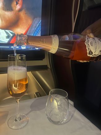 Always fun to have champagne poured at your seat 