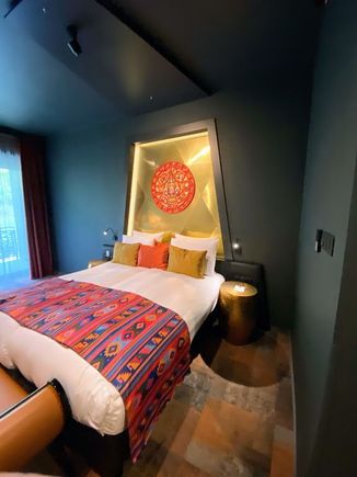 Rooms are nice and spacious, with Aztec style decorations.