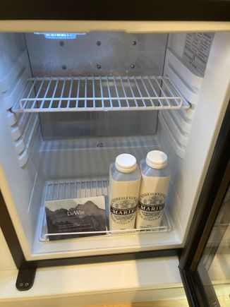 Empty fridge makes it easy to self-cater : 2x flasks of Marie Stella Maris water is daily replenished