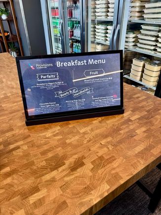 Breakfast menu.  There's an attendant to grab boxes and drinks for you.