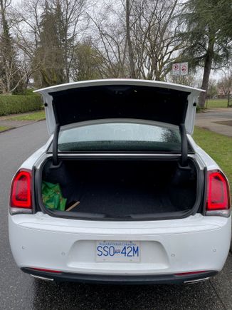 Trunk -- the S has an Alpine Subwoofer in the trunk that the standard 300 does not have 