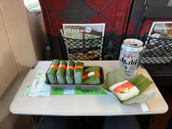 Salmon on rice Bento box and a beer for lunch 