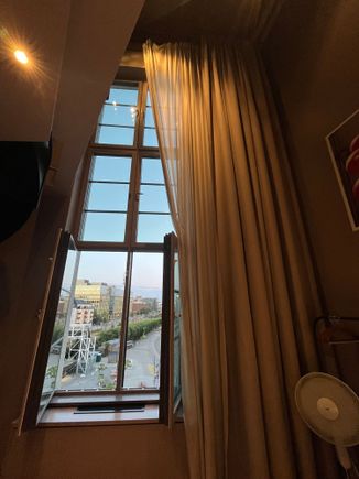Giant windows with only partially light blocking blinds