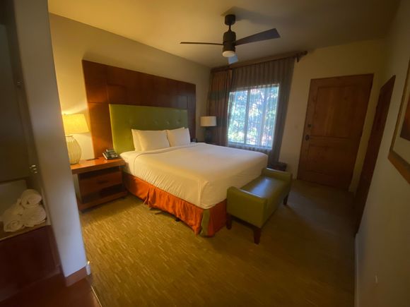 Bedroom; the door at right opens directly to the balcony.