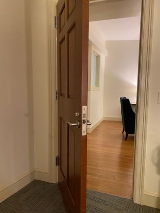 Door between bedroom and living room