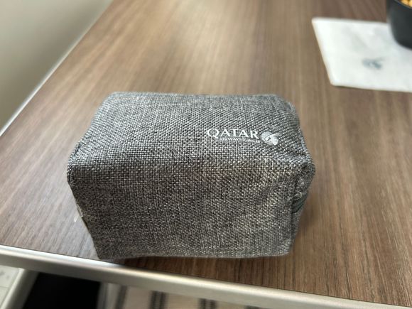 Small pouch containing socks, eye mask and earplugs on short and medium haul flights in J class