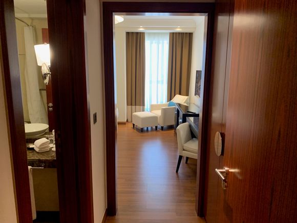 The hallway dividing the two bedrooms