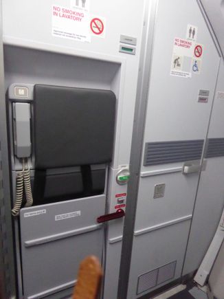 Both toilets, and the in built crew seat and pa on the toilet door.
