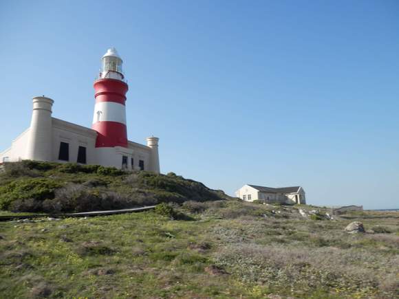 We soon got to the light house. Across from the lighthouse (I believe behind us in this photo) is a welcome centre where we spent some time looking at the exhibits. Next to the lighthouse were toilet facilities which we used as well.