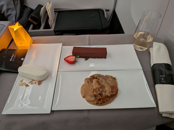 I asked for whatever desserts the very friendly cabin crew member recommended. Glad I did as the halwa was not on my radar. He pointed to the halwa as he served it and seemed genuinely excited to say that it was his favorite. It was indeed very very good. The ice cream was a bit on the frozen side but it was fantastic to mix into the warm halwa. Tiramisu was fine but overshadowed by the halwa.