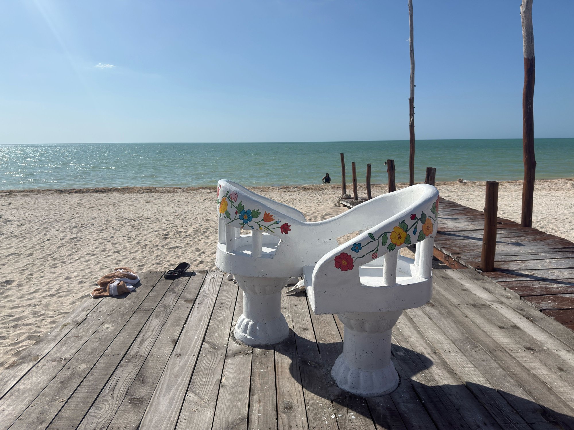 A You and Me chair and the beach.