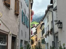 You can see the snow on the mountains above the city