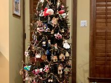 Decorated exclusively with angel ornaments, many now from around the world. Incredibly, she can remember where each one came from. She is Percy-like in that regard. But I hate it when she asks me to tell her their origin because I have a very crappy memory.