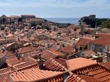 Look at all of this red roofs from the wall.