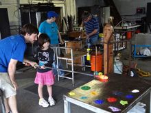 GD adding color to milton glass supervised by Tim, her instructor