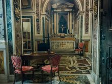 A sealed-off side room, where the Pope and others have met.