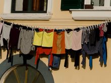 Everyday life across the island included the ubiquitous laundry hung to dry and also...