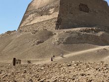 Meidum pyramid with people in front