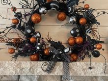 My Halloween wteath. Wish I could say its homemad, but alas, Im not that talented. 