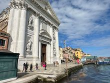 Along the sparkling blue Giudecca Canal