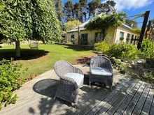 Seats with valley views, over the vineyards. 