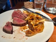 Out of order, but this is the veal that my partner chose as main course; tasty enough but the texture was not as tender as we are used to in the USA.   (Partner does not eat shellfish so he eliminated most of the treasures, both here and at the other restaurants we samples during our week in Galicia)