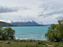 Love the turquoise waters against the snow-covered mountains!