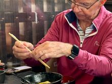 My brother trying to figure out chopsticks 