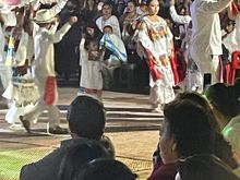 I hope you can see there is a little 3 year old girl dancing away.  Mostly just twirling.  I can't help but think how this will be imprinted on her and how important this is for her culture.