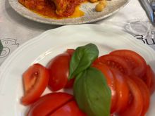 Platter of fresh tomatoes and Ed's cod with tomato sauce and chick peas