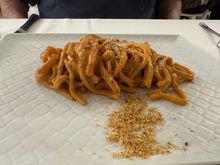 The star of the lunch: Sagnapenta (thick, fresh pasta strands with a sauce of tomato and "ragu Pugliese," made with horsemeat and ricotta forte, and topped with bread crumbs.  Ceglie is the home of ricotta forte, according to our waiter.  This doubly fermented cheese comes in a jar.