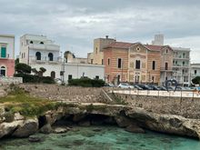 Ionian Sea little beach town of Santa Maria al Bagno, Salento, Puglia; there is a cover with a beautiful sandy beach, just to the right.  Building with the stripes, 19th Century, si RISTORANTE ART NOUVEAU